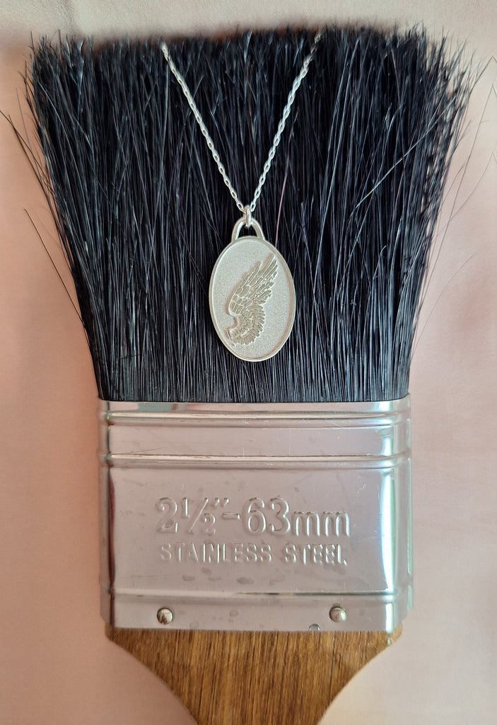 minimal silver lucky charm 2026 wings necklace