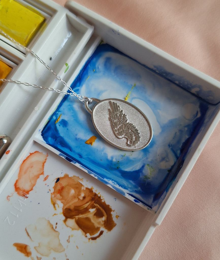 angel wings silver pendant